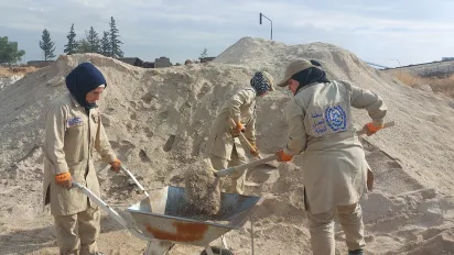 Women workers removing debris resulting from the conflict and the earthquake that hit parts of Syria in 2023